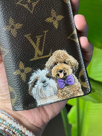 A super personal commission. I painted these two adorable puppy portraits on a client's Louis Vuitton card holder. It's my favorite way to immortalize a beloved pet.