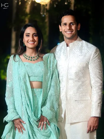 An all-cream look exudes timeless sophistication. This custom bandhgala features subtle self-embroidery, creating a rich texture that is perfect for a day or evening wedding ceremony.