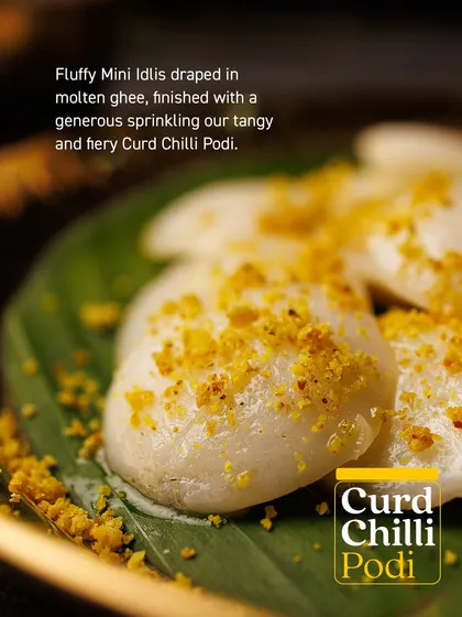 Look at these fluffy mini idlis, generously drizzled with molten ghee and sprinkled with my tangy and fiery Curd Chilli Podi. This is how I love to enjoy them, a simple dish transformed into a flavourful experience.