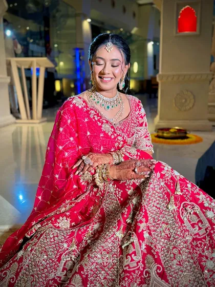 The joy on a bride's face is everything. The makeup is designed to be comfortable and long-lasting, so she can enjoy her day without any worries.