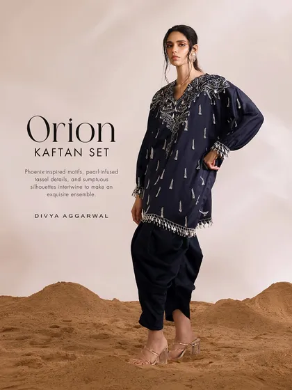 The Orion Kaftan Set, a perfect example of refined craftsmanship with its intricate tassel embellishments and enchanting aura.