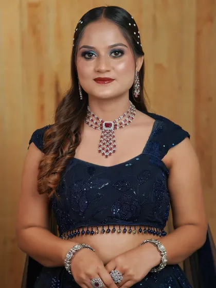 A full shot of the cocktail look, demonstrating the student's ability to create a cohesive and glamorous ensemble.