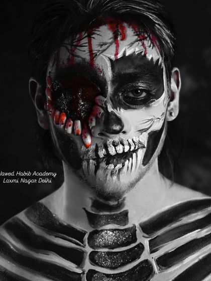 A striking half-skull, half-gory SFX makeup look. This image demonstrates the blend of anatomical drawing and realistic wound effects taught in our advanced courses.