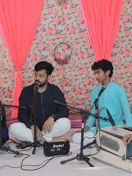 An ensemble of students performing together, with vocal, harmonium, and tabla. Learning to perform in a group is an important skill for any musician.