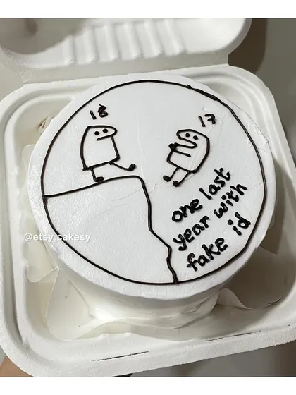 A humorous take on turning 18, this bento cake has a meme design with the text 'one last year with fake id'.