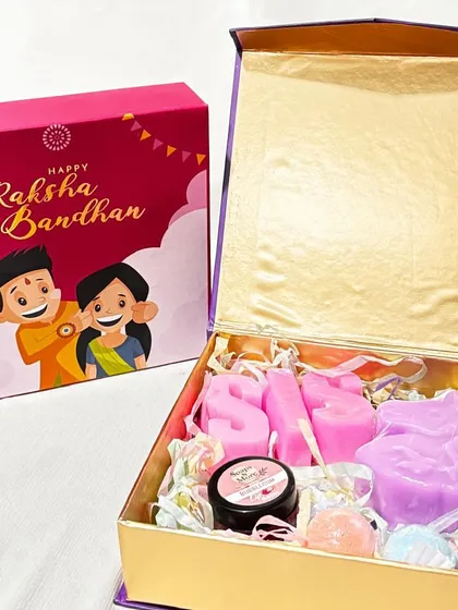 This Raksha Bandhan hamper is perfect for a little sister. It comes in a magnetic box and is filled with a 'SIS' letter soap, mini bath bombs, a unicorn soap, and an organic lip balm.