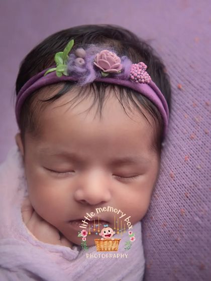 A close-up of this beautiful purple setup, focusing on the delicate floral headband that adds a sweet, feminine touch to the portrait.