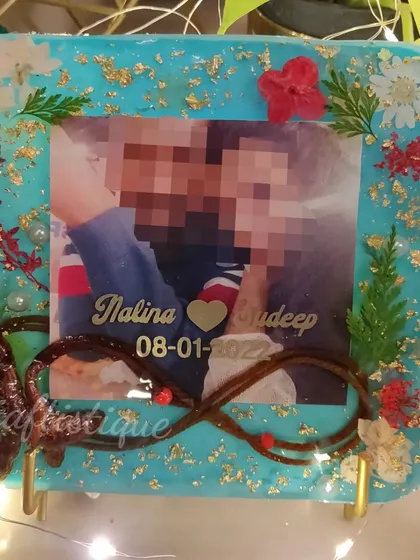 The thali rope is such a sacred part of a wedding ceremony. I preserved it here in this custom resin photo frame, creating an infinity symbol to represent everlasting love.