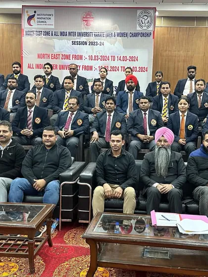 A series of photos showing the dedicated group of officials, judges, and technical committee members from the North East Zone & All India University Karate Championship. It takes a large, coordinated team to run a successful national-level event.