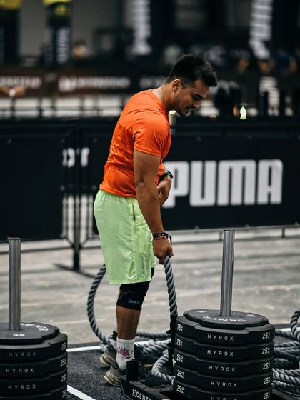 A side view of the sled pull. This angle shows the importance of keeping a straight back and driving through the legs to initiate the pull.