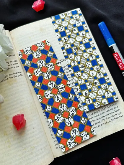 I love the contrast of orange and blue in these geometric bookmarks. The intricate patterns are all hand-drawn, making each bookmark a unique mini-artwork.