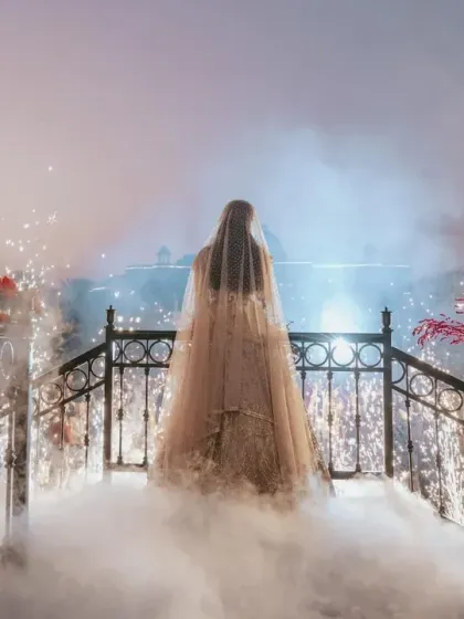 A bride’s entry should be nothing short of magical. We created this ethereal moment with a pathway of cold pyros and low-lying fog, making her walk towards the mandap feel like a scene from a dream.