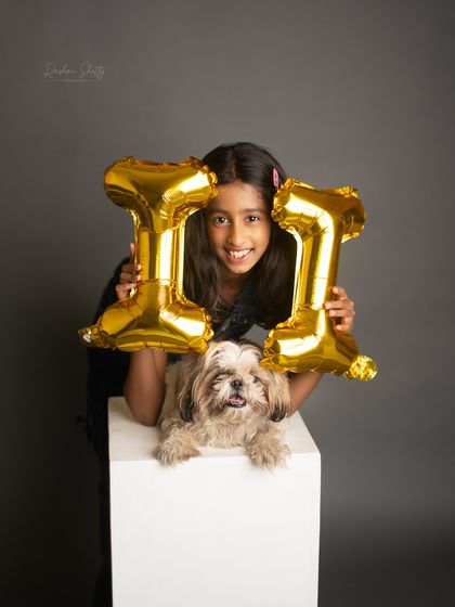 Another take on the 11th birthday celebration, with a big, happy smile. This black and white photo is a perfect keepsake of this milestone.