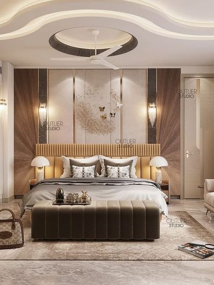Sweet dreams are made of these cozy and chic interiors. This luxurious bedroom features a beautiful curved ceiling, a statement art piece above the bed, and a soft, inviting color palette.