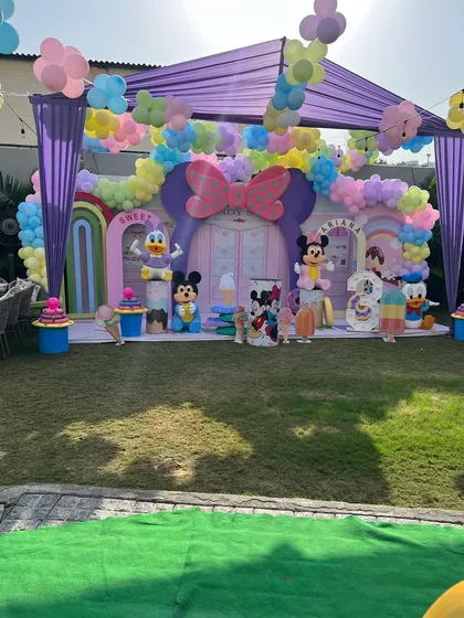 An elaborate Minnie's Sweet Shop theme, combining the charm of Disney with the sweetness of a candy store.