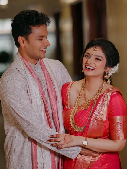 During their engagement ceremony, a couple shares a moment of pure, unscripted laughter. I focus on capturing these genuine emotions that make your event unique.