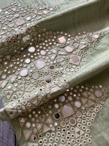 Another macro shot of the mirrorwork, showing the different shapes of mirrors used.