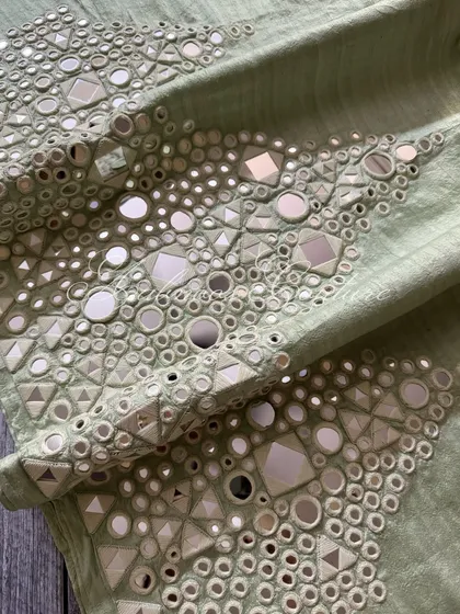 Another macro shot of the mirrorwork, showing the different shapes of mirrors used.