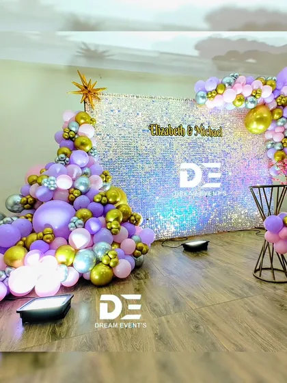 For a touch of modern glamour, I use high-impact backdrops like this iridescent sequin wall. Paired with a sophisticated balloon arrangement in purple, silver, and gold, it creates a stunning photo opportunity for any birthday or private party.