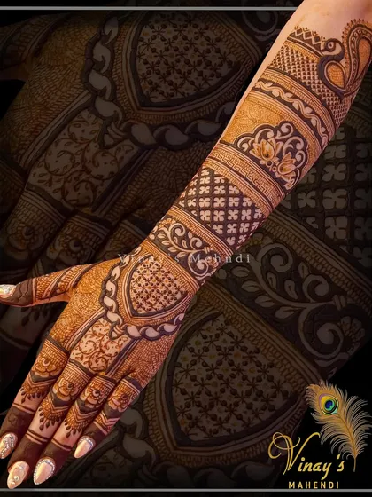 A lovely back-of-hand design with heart-shaped spaces and delicate traditional patterns.