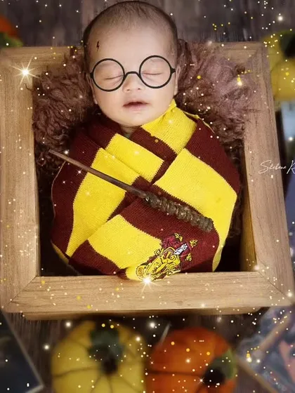 My very own Harry Puttar. This magical Harry Potter theme is perfect for fans, complete with a wand, glasses, and a Gryffindor scarf for our sleeping wizard.