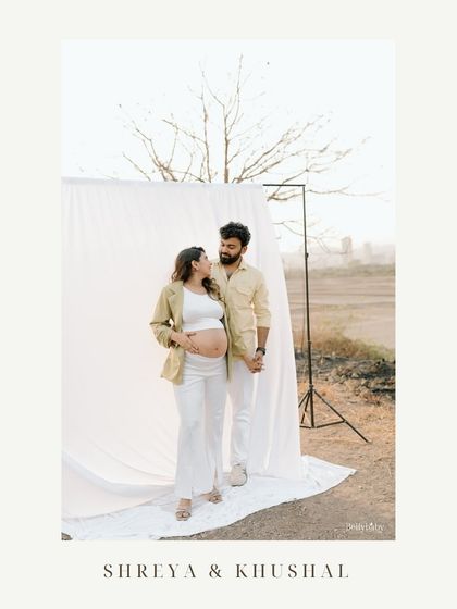 Using a simple white backdrop outdoors allows us to create a studio feel while still being surrounded by nature's soft light.