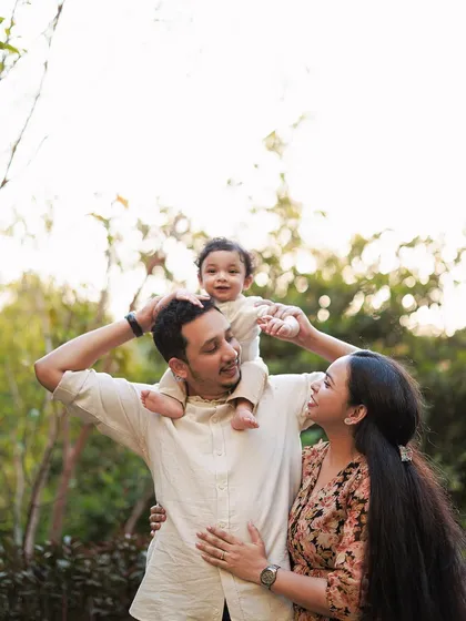 In-between moments of love are often the most beautiful. This candid outdoor family photo captures the natural, loving interactions that I look for during a lifestyle session.