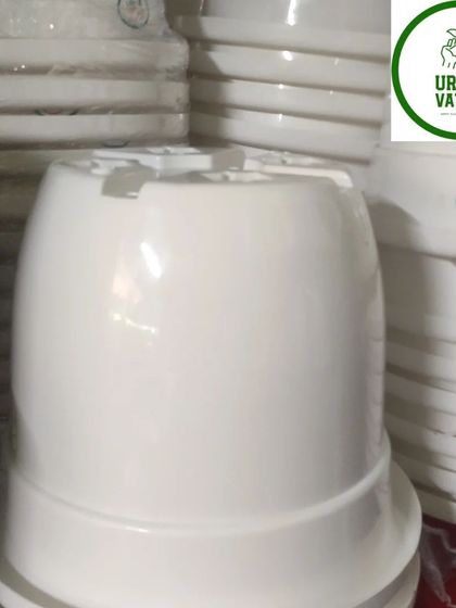 Basic white plastic pots.