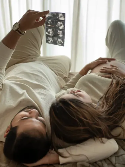 A quiet moment of dreaming together. Using your ultrasound scan as a prop makes the session deeply personal, as you both lie back and imagine the wonderful future ahead with your little one.