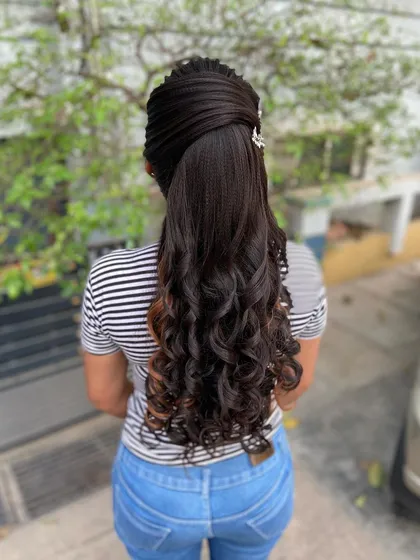 The full back view of the Christian bridal ponytail, a modern and sophisticated choice.