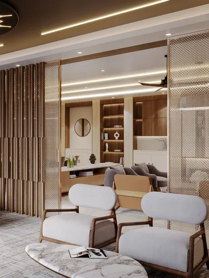 This view shows the seating area within the suite, separated by a decorative metal mesh screen.