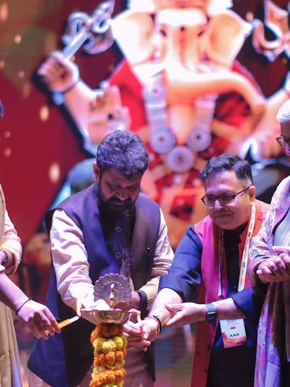 The lamp lighting ceremony at the Ganga Kinare Music Festival. This shot documents the esteemed guests and dignitaries inaugurating the event, a crucial part of corporate event coverage.