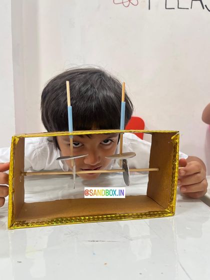 A close-up look at a student's creation. By building these simple machines, children gain a practical understanding of physics that goes beyond textbook learning.