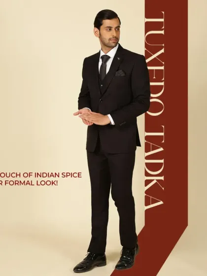 Tuxedo Tadka. Add a touch of Indian spice to your formal look. This classic black three-piece suit is a timeless statement of elegance.