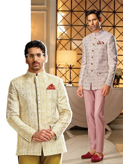 We offer elegance in a variety of palettes. This image showcases two of our patterned Jodhpuri jackets, one in a classic ivory and the other in a soft pastel pink.