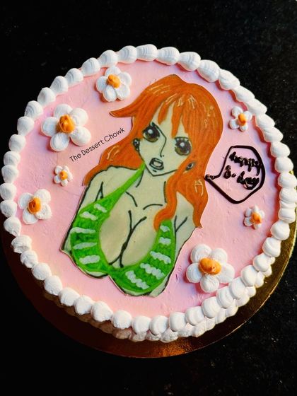 A hand-drawn anime character cake for a fan's birthday, made with my rich chocolate truffle flavour.