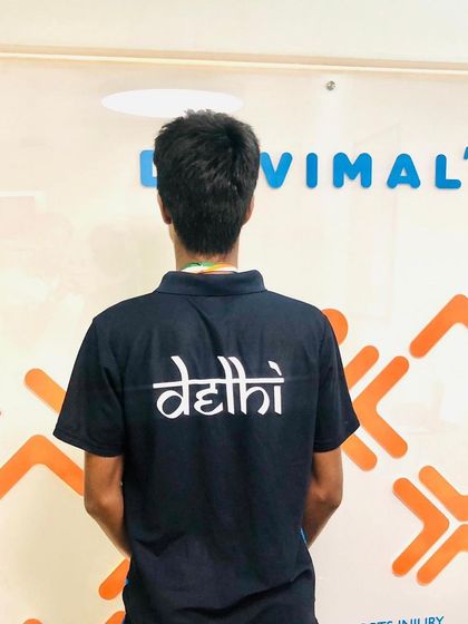 Ayush Sharma proudly wearing his Delhi team jersey at our clinic. We are committed to supporting local athletes as they represent our city and strive for excellence.