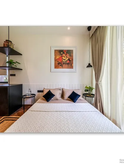 Another angle of the prefab bedroom, showing the compact kitchenette and storage solutions. This image demonstrates how modern prefab design can be both stylish and highly practical.