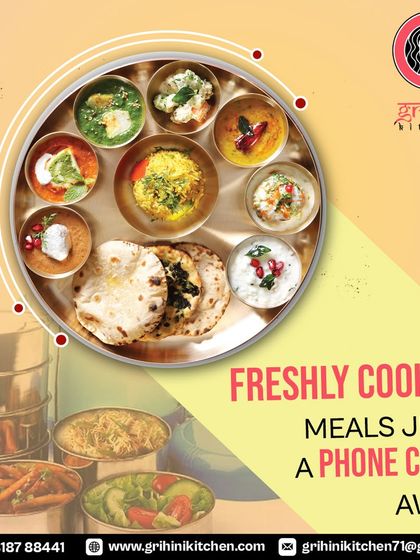 Freshly cooked meals are just a phone call away. This image shows a variety of dishes packed in tiffin containers, ready to be delivered.