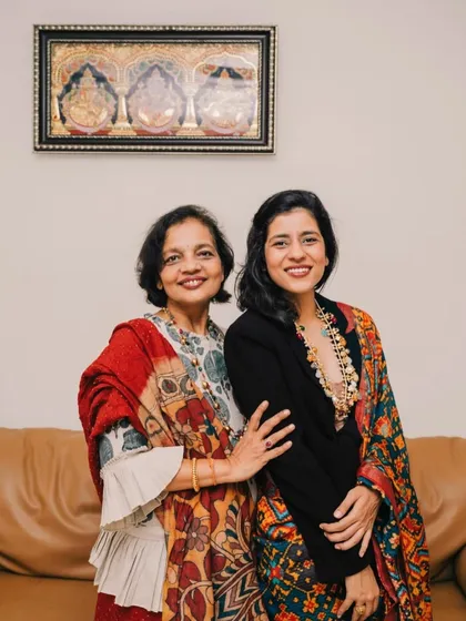 A cherished memory with my mom. Her beautiful printed saree and my modern take with a statement necklace show our shared love for fashion.