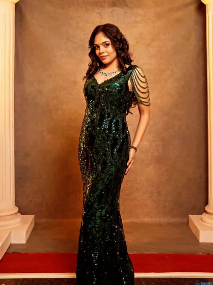 The stunning Nayana Sai wearing my custom emerald green sequin gown. The fit is tailored to perfection, and the draped shoulder beading adds a touch of unique elegance.