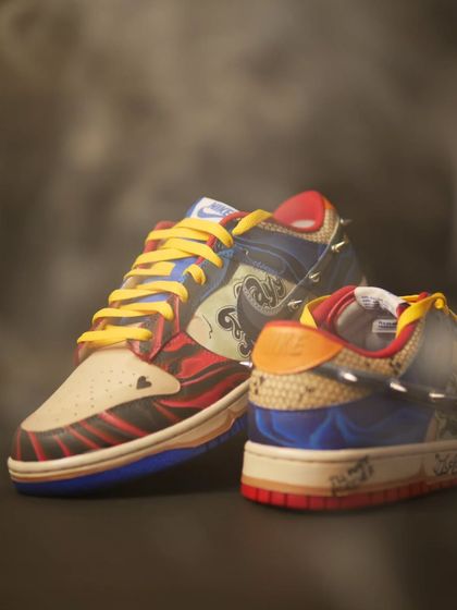 Another moody shot of the Harley Quinn custom Dunks. The colors, textures, and spikes all work together to create a really unique piece.