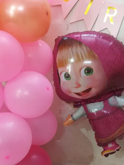 Close-up of the Masha foil balloon used in our Masha and the Bear theme.