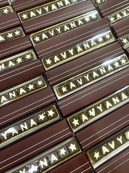 A sweet welcome for little Avyana. We created these custom chocolate bars with her name for her naming ceremony, a memorable favor for guests to take home.