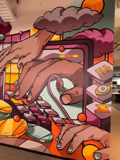 A close-up of the finished engineering mural, highlighting the crisp lines and bold, flat colors.