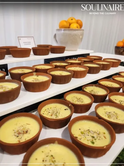 A beautiful display of Phirni in traditional terracotta bowls, part of a handcrafted luxury experience for our clients in Ahmedabad.