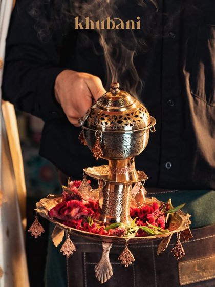 Love is in the air, and so is the intoxicating scent of tradition. We use elements like this ornate incense burner to create an authentic Middle Eastern ambiance that makes any romantic evening magical.