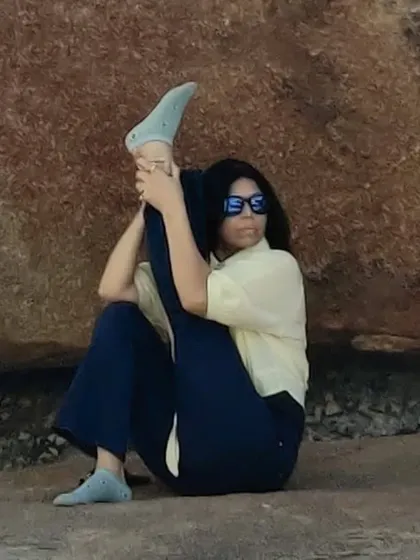 A deep seated stretch against a natural rock formation. This pose, Krounchasana or Heron Pose, is a powerful hamstring stretch that requires patience. My practice is a constant reminder to be patient with my body.