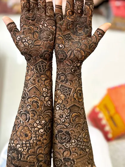 A perfectly symmetrical full-arm design, where every detail on the left arm is mirrored on the right, showcasing my precision and skill.
