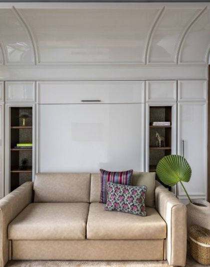 Art defines this Neo-Classical guest bedroom. A quiet still life of lemons becomes a bold statement, adding a touch of the unexpected to a traditional space.